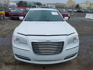 2014 Chrysler 300 with VIN 2C3CCAAG2EH235495, listed as a IAAI auction lot 41787801 with 142,354 mi miles and . Bid and sale history available at DreamBid. Image 12.