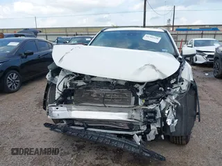 2020 Toyota RAV4 XLE with VIN JTMW1RFV0LD521893, listed as a IAAI auction lot 42701228 with 34,647 mi miles and . Bid and sale history available at DreamBid. Image 13.