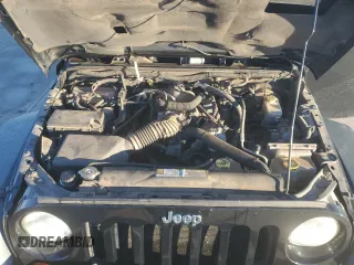 2010 Jeep Wrangler Rubicon with VIN 1J4BA6D10AL203265, listed as a Copart auction lot 79570754 with 114,840 mi miles and Salvage title. Bid and sale history available at DreamBid. Image 11.