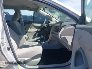 2009 Toyota Corolla with VIN 1NXBU40E79Z134599, listed as a IAAI auction lot 42035077 with 154,051 mi miles. Bid and sale history available at carsss.com. Image 5.