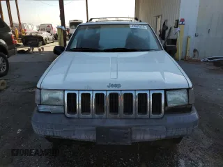 1997 Jeep Grand Cherokee TSi with VIN 1J4FX58S2VC612449, listed as a Copart auction lot 43532675 with 221,382 mi miles and Salvage Title. Bid and sale history available at carsss.com. Image 5.