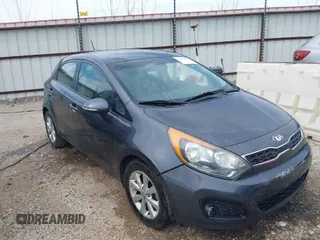 2013 Kia Rio SX with VIN KNADN5A39D6302606, listed as a IAAI auction lot 41790644 with 145,872 mi miles. Bid and sale history available at carsss.com. Image 1.