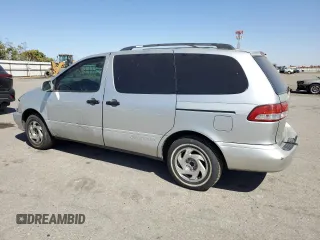 2002 Toyota Sienna LE with VIN 4T3ZF13CX2U458385, listed as a Copart auction lot 69523254 with 187,836 mi miles and Salvage Title. Bid and sale history available at carsss.com. Image 2.
