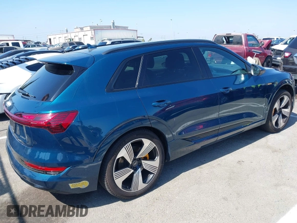 2022 Audi e-tron Premium Plus with VIN WA1LAAGE1NB008616, listed as a IAAI auction lot 42723244 with 36,800 mi miles and . Bid and sale history available at DreamBid. Image 4.