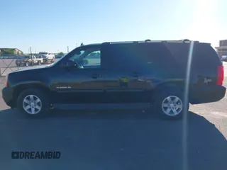 2013 GMC Yukon XL SLT with VIN 1GKS1KE07DR357949, listed as a IAAI auction lot 42227558 with 232,071 mi miles and . Bid and sale history available at DreamBid. Image 14.
