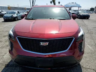 2019 Cadillac XT4 FWD Sport with VIN 1GYFZER4XKF167897, listed as a Copart auction lot 59224635 with 37,770 mi miles and Salvage title. Bid and sale history available at DreamBid. Image 5.