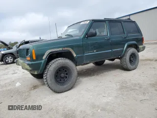 2001 Jeep Cherokee Sport z VIN 1J4FF58SX1L615967, wystawiony jako Copart lot #43709235 z przebiegiem 241 326 mil mil oraz Czysty tytuł • Clean title. Historia ofert i sprzedaży dostępna na DreamBid. Obrazek 1.