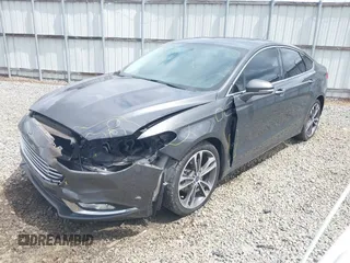 2017 Ford Fusion Titanium with VIN 3FA6P0K98HR363360, listed as a IAAI auction lot 42461432 with 182,807 mi miles and . Bid and sale history available at DreamBid. Image 17.