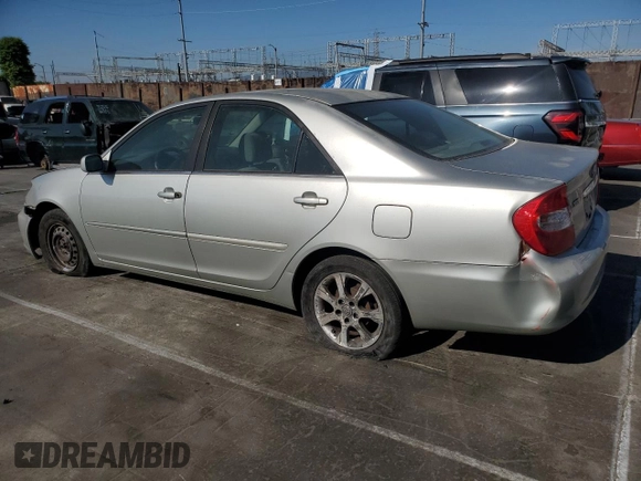 2003 Toyota Camry LE with VIN JTDBE32K930176303, listed as a Copart auction lot 52633565 with 168,231 mi miles and Salvage Title. Bid and sale history available at DreamBid. Image 2.