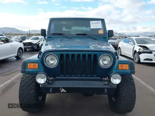 1998 Jeep Wrangler Sport with VIN 1J4FY19S7WP787679, listed as a IAAI auction lot 41764883 with 134,144 mi miles. Bid and sale history available at carsss.com. Image 12.
