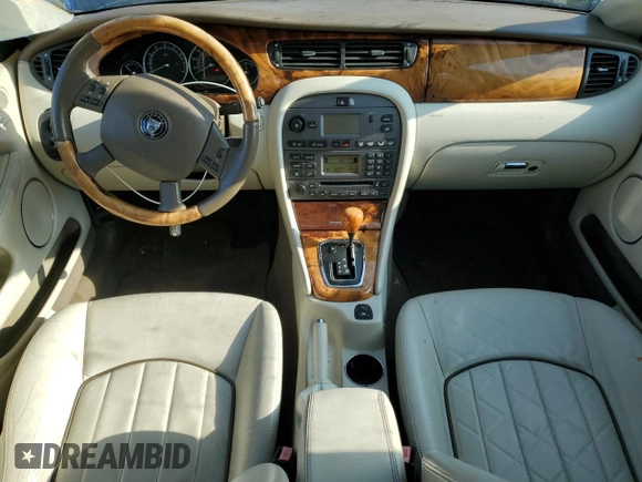 2007 Jaguar X-Type z VIN SAJWA51A17WJ20376, wystawiony jako Copart lot #52513655 z przebiegiem 162 104 mil mil oraz Tytuł czysty. Historia ofert i sprzedaży dostępna na DreamBid. Obrazek 8.