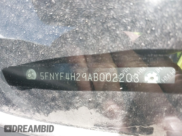 2010 Honda Pilot LX with VIN 5FNYF4H29AB002203, listed as a IAAI auction lot 40858777 with 128,621 mi miles and . Bid and sale history available at DreamBid. Image 12.