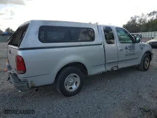 2001 Ford F-150 Work Series with VIN 2FTRX17W21CA26757, listed as a Copart auction lot 79602654 with 0 mi miles and Non Repairable. Bid and sale history available at carsss.com. Image 3.