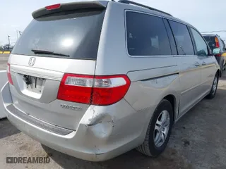 2005 Honda Odyssey EX-L with VIN 5FNRL38745B126338, listed as a IAAI auction lot 41991119 with 165,552 mi miles. Bid and sale history available at carsss.com. Image 6.