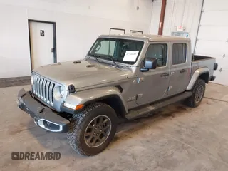 2021 Jeep Gladiator High Altitude with VIN 1C6HJTFG1ML556741, listed as a IAAI auction lot 42240680 with 47,926 mi miles and . Bid and sale history available at DreamBid. Image 2.