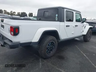 2022 Jeep Gladiator Willys with VIN 1C6HJTAG1NL148524, listed as a IAAI auction lot 41507693 with 42,004 mi miles and . Bid and sale history available at DreamBid. Image 4.