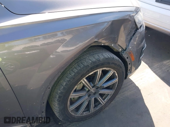 2017 Audi Q7 Premium with VIN WA1AAAF71HD010675, listed as a IAAI auction lot 41956959 with 136,549 mi miles and . Bid and sale history available at DreamBid. Image 12.