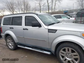 2011 Dodge Nitro Heat with VIN 1D4PU4GK6BW607590, listed as a IAAI auction lot 41810823 with 87,179 mi miles. Bid and sale history available at carsss.com. Image 13.