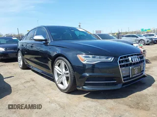 2016 Audi S6 Prestige z VIN WAUH2AFC6GN130251, wystawiony jako IAAI lot #41912382 z przebiegiem 72 512 mil mil oraz . Historia ofert i sprzedaży dostępna na DreamBid. Obrazek 1.