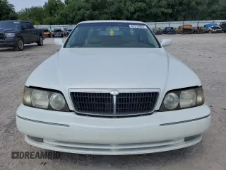 1999 Infiniti Q45 z VIN JNKBY31A2XM603477, wystawiony jako Copart lot #64216924 z przebiegiem 278 602 mil mil oraz Szkody całkowita. Historia ofert i sprzedaży dostępna na DreamBid. Obrazek 5.