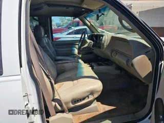 2000 Cadillac Escalade z VIN 1GYEK63R3YR218285, wystawiony jako Copart lot #77915654 z przebiegiem 190 444 mil mil oraz Tytuł czysty. Historia ofert i sprzedaży dostępna na DreamBid. Obrazek 5.