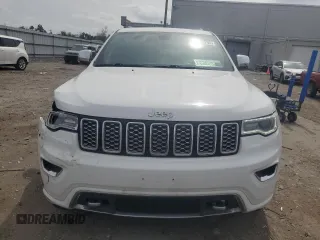 2018 Jeep Grand Cherokee Overland with VIN 1C4RJFCG5JC437508, listed as a Copart auction lot 51814795 with 104,598 mi miles and Salvage title. Bid and sale history available at DreamBid. Image 5.