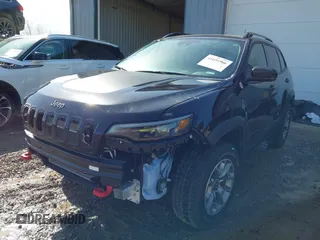 2022 Jeep Cherokee Trailhawk with VIN 1C4PJMBX0ND500947, listed as a IAAI auction lot 41691906 with 16,163 mi miles. Bid and sale history available at carsss.com. Image 18.