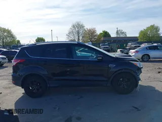 2016 Ford Escape Titanium with VIN 1FMCU9J94GUA06028, listed as a IAAI auction lot 42102769 with 88,278 mi miles. Bid and sale history available at carsss.com. Image 14.
