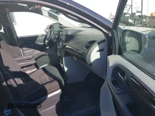 2016 Dodge Grand Caravan SE with VIN 2C4RDGBG8GR276120, listed as a IAAI auction lot 40621416 with 58,884 mi miles and . Bid and sale history available at DreamBid. Image 5.