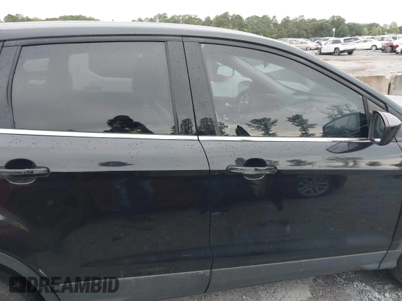 2014 Ford Escape SE with VIN 1FMCU0GX9EUB21853, listed as a IAAI auction lot 40313063 with 106,687 mi miles. Bid and sale history available at carsss.com. Image 13.