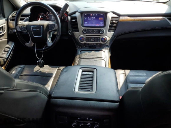 2015 GMC Yukon Denali with VIN 1GKS2CKJXFR547358, listed as a Copart auction lot 63906734 with 163,980 mi miles and Salvage Title. Bid and sale history available at carsss.com. Image 8.