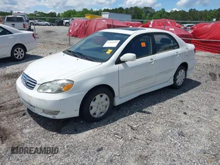 2003 Toyota Corolla CE with VIN 1NXBR32E73Z185570, listed as a IAAI auction lot 42201684 with 299,999 mi miles and . Bid and sale history available at DreamBid. Image 2.