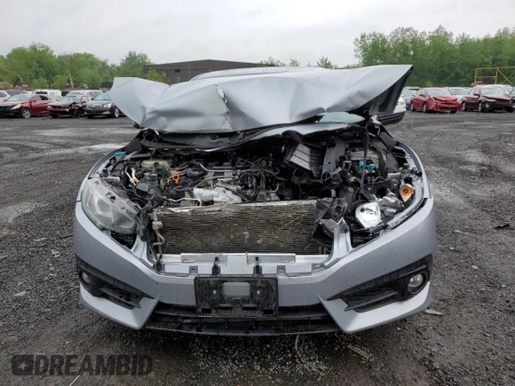 2017 Honda Civic EX-L z VIN 19XFC1F74HE209787, wystawiony jako Copart lot #56352415 z przebiegiem 130 264 mil mil oraz Szkoda całkowita • Salvage title. Historia ofert i sprzedaży dostępna na DreamBid. Obrazek 5.
