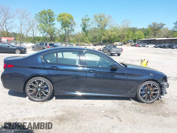 2021 BMW 5 Series 540i z VIN WBA53BJ04MWX00840, wystawiony jako IAAI lot #42056206 z przebiegiem 33 486 mil mil oraz . Historia ofert i sprzedaży dostępna na DreamBid. Obrazek 13.