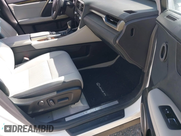 2018 Lexus RX 350 with VIN 2T2BZMCA2JC164234, listed as a IAAI auction lot 42030641 with 74,160 mi miles and . Bid and sale history available at DreamBid. Image 5.