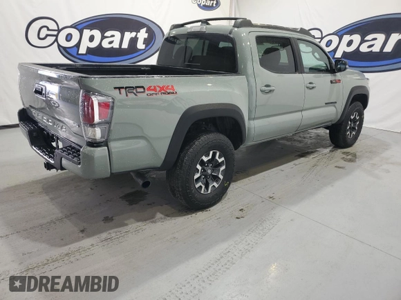 2023 Toyota Tacoma SR5 z VIN 3TMAZ5CN3PM210839, wystawiony jako Copart lot #88169495 z przebiegiem 17 766 mil mil oraz Czysty tytuł • Clean title. Historia ofert i sprzedaży dostępna na DreamBid. Obrazek 3.