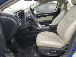 2017 Ford Fusion Hybrid Titanium with VIN 3FA6P0RU1HR138725, listed as a Copart auction lot 56650625 with 77,331 mi miles and Salvage title. Bid and sale history available at DreamBid. Image 7.