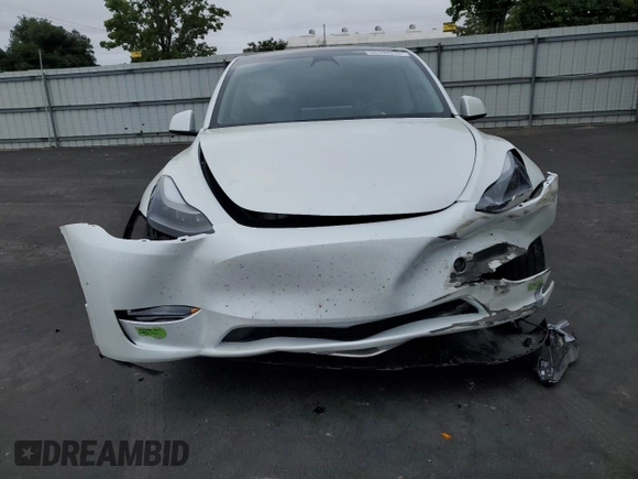 2023 Tesla Model Y Long Range with VIN 7SAYGDEEXPF744472, listed as a Copart auction lot 54109315 with 15,404 mi miles and Salvage Title. Bid and sale history available at DreamBid. Image 5.