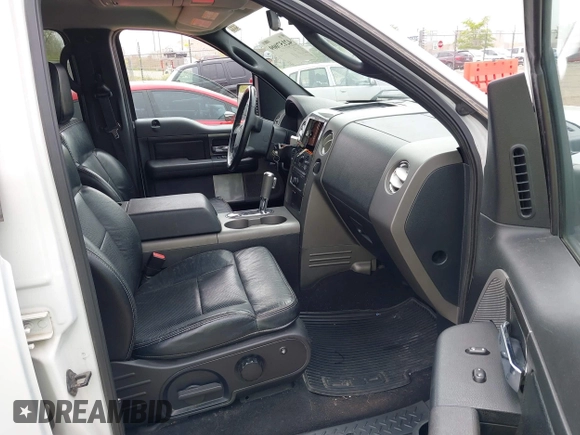 2005 Ford F-150 XLT with VIN 1FTPW14595FA87670, listed as a IAAI auction lot 42157009 with 291,713 mi miles. Bid and sale history available at carsss.com. Image 5.