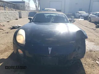 2009 Pontiac Solstice GXP z VIN 1G2MT35X19Y105245, wystawiony jako Copart lot #89054685 z przebiegiem 141 283 mil mil oraz Szkoda całkowita • Salvage title. Historia ofert i sprzedaży dostępna na DreamBid. Obrazek 5.