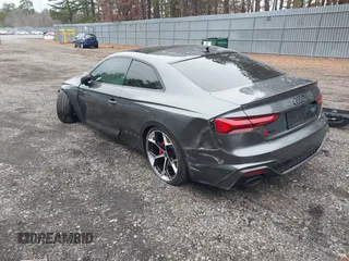 2023 Audi RS 5 z VIN WUANWAF55PA902356, wystawiony jako IAAI lot #41034121 z przebiegiem 3 717 mil mil oraz . Historia ofert i sprzedaży dostępna na DreamBid. Obrazek 3.