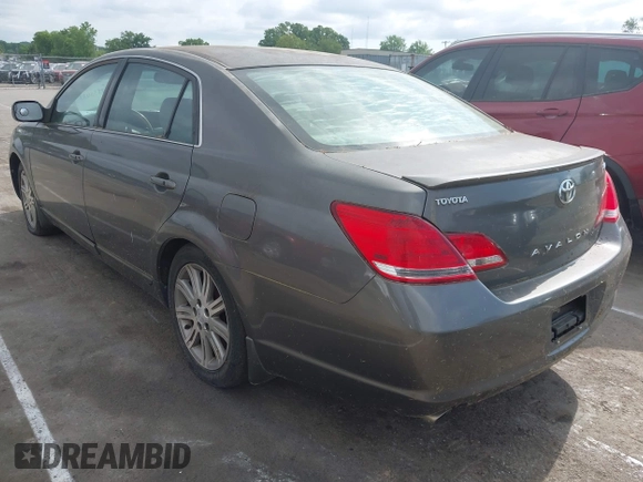 2006 Toyota Avalon XL with VIN 4T1BK36B86U093201, listed as a IAAI auction lot 42155033 with 264,958 mi miles. Bid and sale history available at carsss.com. Image 3.