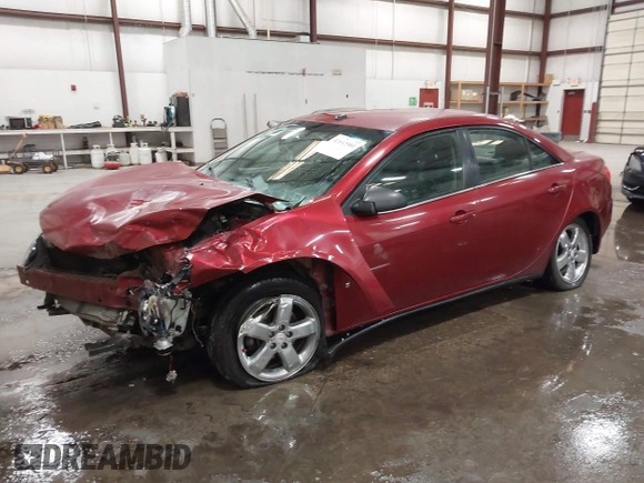 2008 Pontiac G6 1SV Value Leader z VIN 1G2ZF57BX84123601, wystawiony jako IAAI lot #42152501 z przebiegiem Nie podano mil oraz . Historia ofert i sprzedaży dostępna na DreamBid. Obrazek 17.