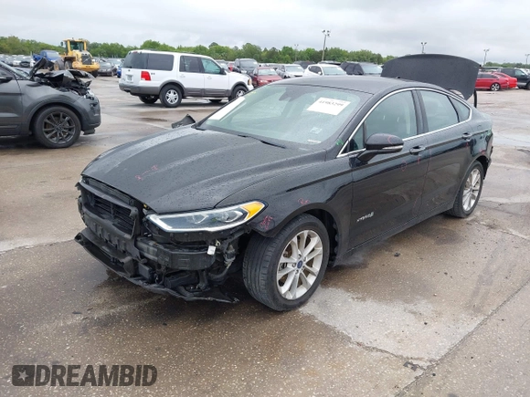 2019 Ford Fusion Hybrid SEL with VIN 3FA6P0MU1KR202860, listed as a IAAI auction lot 41983299 with 133,671 mi miles. Bid and sale history available at carsss.com. Image 18.