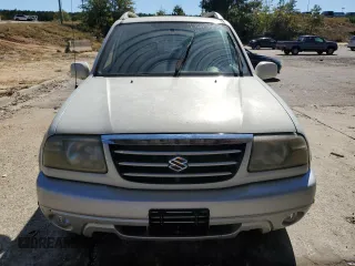2004 Suzuki Grand Vitara z VIN JS3TE62V544100024, wystawiony jako Copart lot #75613324 z przebiegiem Nie podano mil oraz Czysty tytuł • Clean title. Historia ofert i sprzedaży dostępna na DreamBid. Obrazek 5.