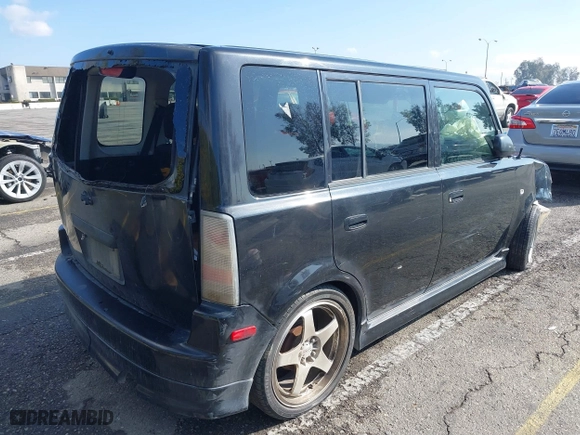 2004 Scion xB with VIN JTLKT324840149980, listed as a IAAI auction lot 41670229 with 193,674 mi miles. Bid and sale history available at carsss.com. Image 4.