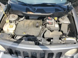 2011 Jeep Patriot Sport with VIN 1J4NT1GB6BD287389, listed as a Copart auction lot 56495085 with 188,650 mi miles and Salvage title. Bid and sale history available at DreamBid. Image 12.