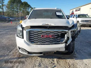 2018 GMC Yukon Denali with VIN 1GKS2CKJ4JR218924, listed as a IAAI auction lot 41702225 with 114,719 mi miles. Bid and sale history available at carsss.com. Image 12.