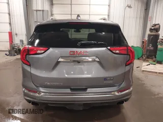 2019 GMC Terrain Denali z VIN 3GKALXEX2KL174723, wystawiony jako IAAI lot #41453790 z przebiegiem 77 193 mil mil oraz . Historia ofert i sprzedaży dostępna na DreamBid. Obrazek 16.