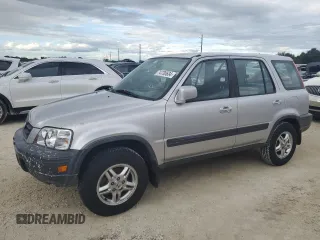 1999 Honda CR-V EX with VIN JHLRD1865XC064542, listed as a Copart auction lot 74730634 with 71,298 mi miles and Salvage Title. Bid and sale history available at carsss.com. Image 1.